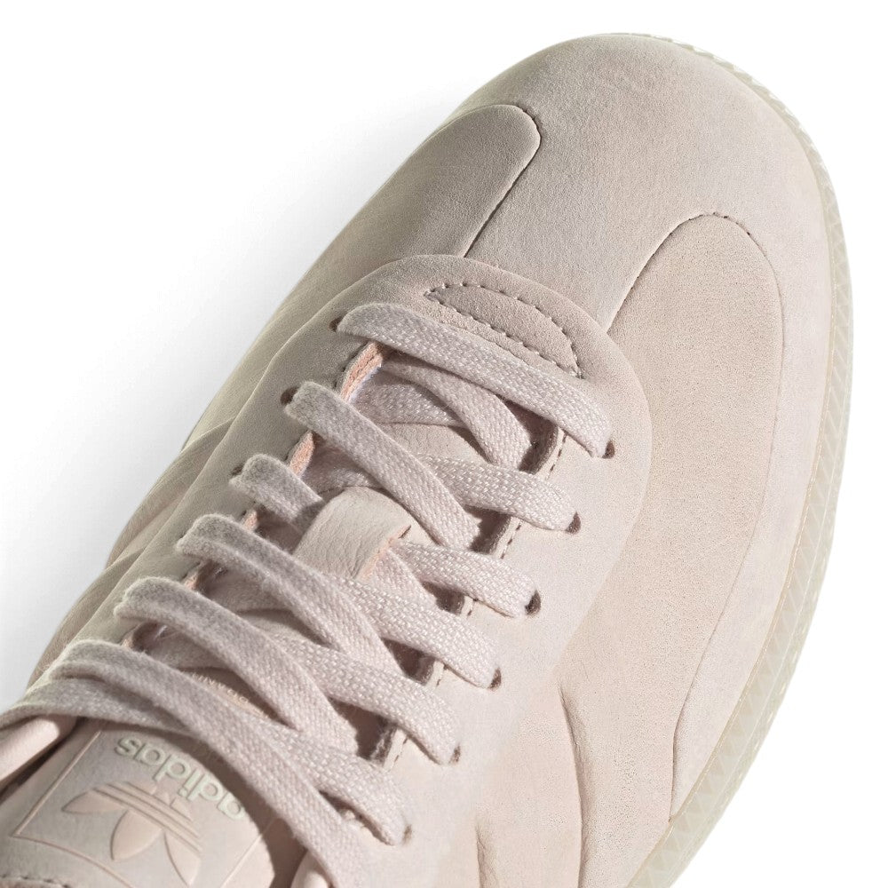 Zoom Looking at the Front of the Shoes and Laces: Macro focus on the perforated toe box detailing, tonal eyestays, and matching flat laces.   