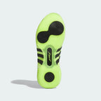 View of the rubber outsole of the D.O.N. Issue #5, showcasing the intricate blue and lemon traction pattern for maximum court grip.