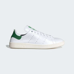 Side Profile Image: The Cloud White Stan Smith Decon, highlighting the thin, premium leather and the classic green heel tab.