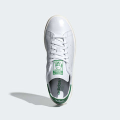 Top-Down View of Pair: Looking down at the unlined leather tongue and the iconic green Stan Smith portrait branding.