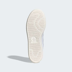 Outsole View: The classic pimpled rubber tread pattern in a clean Core White finish.
