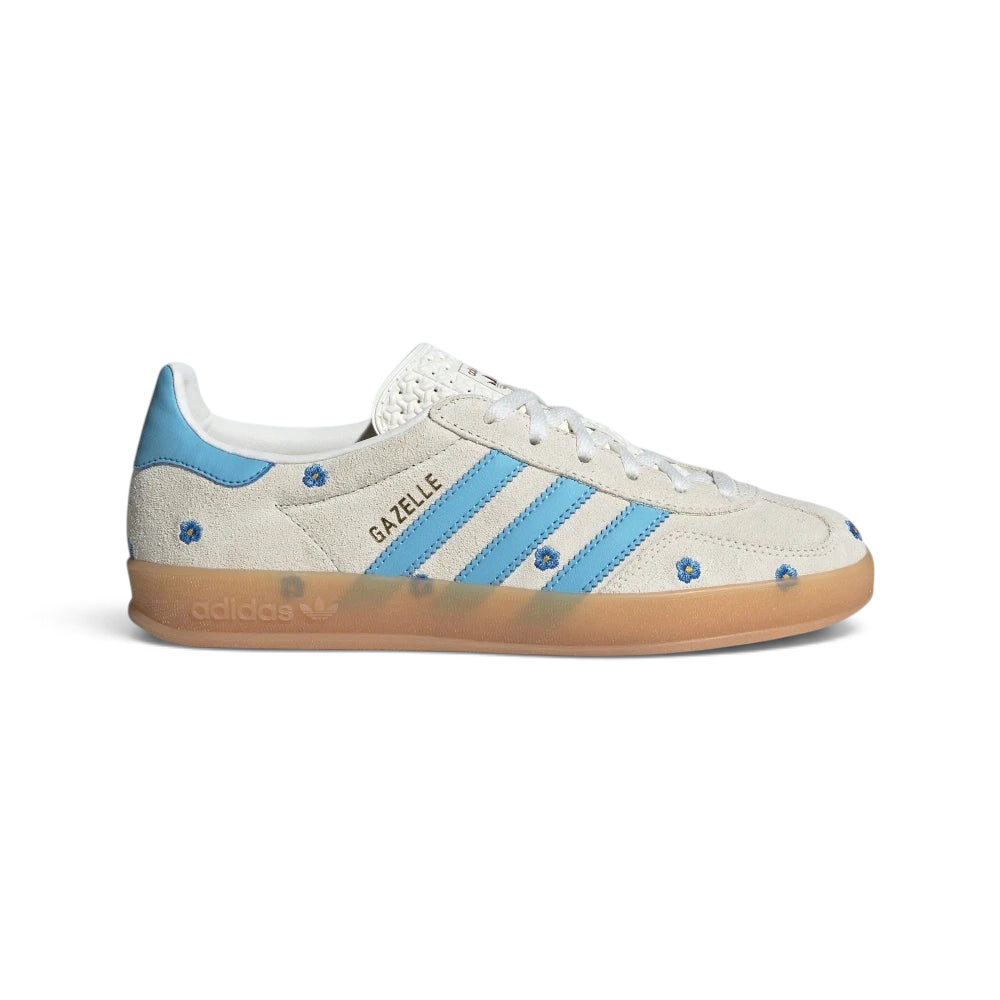 Highlights the high-velocity sweep of the Light Blue serrated 3-Stripes intertwined with the professional, high-definition embroidery of the colorful floral details on the Light Brown suede.
