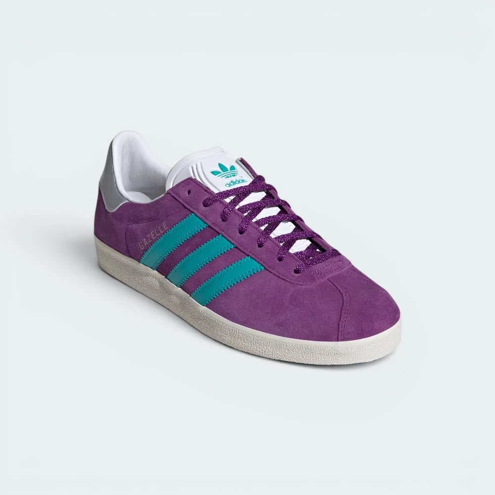 Emphasising the retro low-top silhouette and the professional alignment of the clean white foxing tape lines cutting around the base.