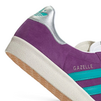 Highlights the "unreal" clean finish where the vintage-style white rubber sidewalls bond securely to the rich purple nubuck upper.