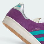 Highlights the "unreal" clean finish where the vintage-style white rubber sidewalls bond securely to the rich purple nubuck upper.
