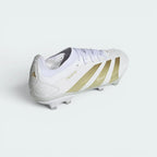 Focuses on the contoured shape of the white heel counter, showing a clean finish built to keep ankles supported.