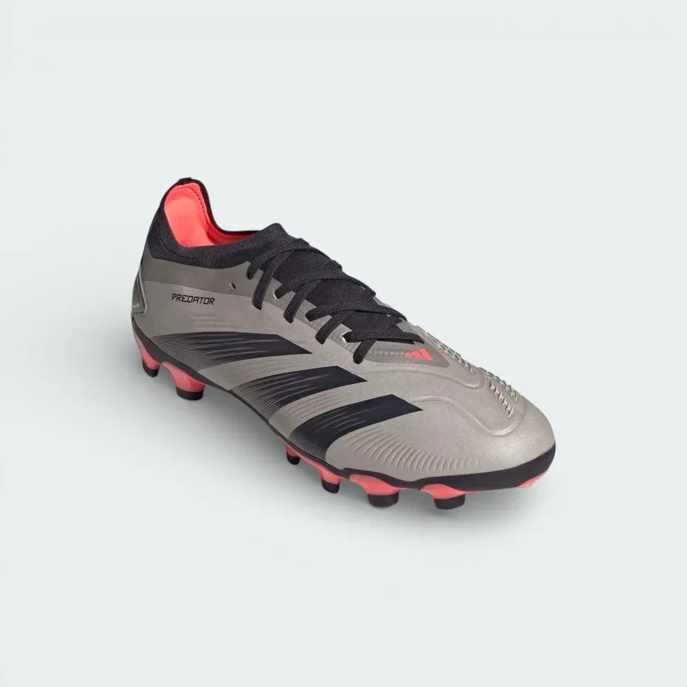 Angled shot of both boots side by side, showcasing the metallic platinum finish and the high-performance silhouette of the Predator Pro series.