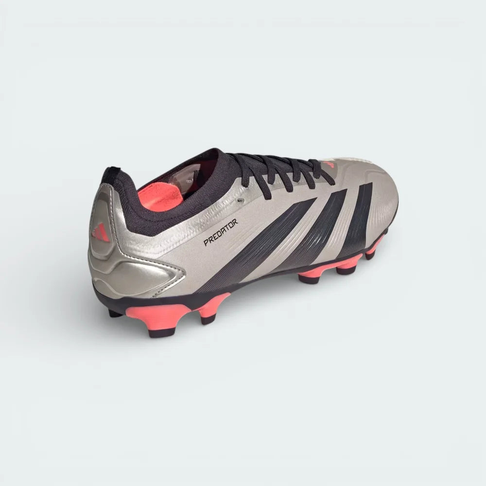 Rear view focusing on the Turbo pink heel structure and the Primeknit collar, illustrating the supportive fit and Predator branding.