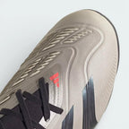 Close-up of the front, showing the detailed rubber Strikeskin elements and the precision lacing system for a secure lockdown.