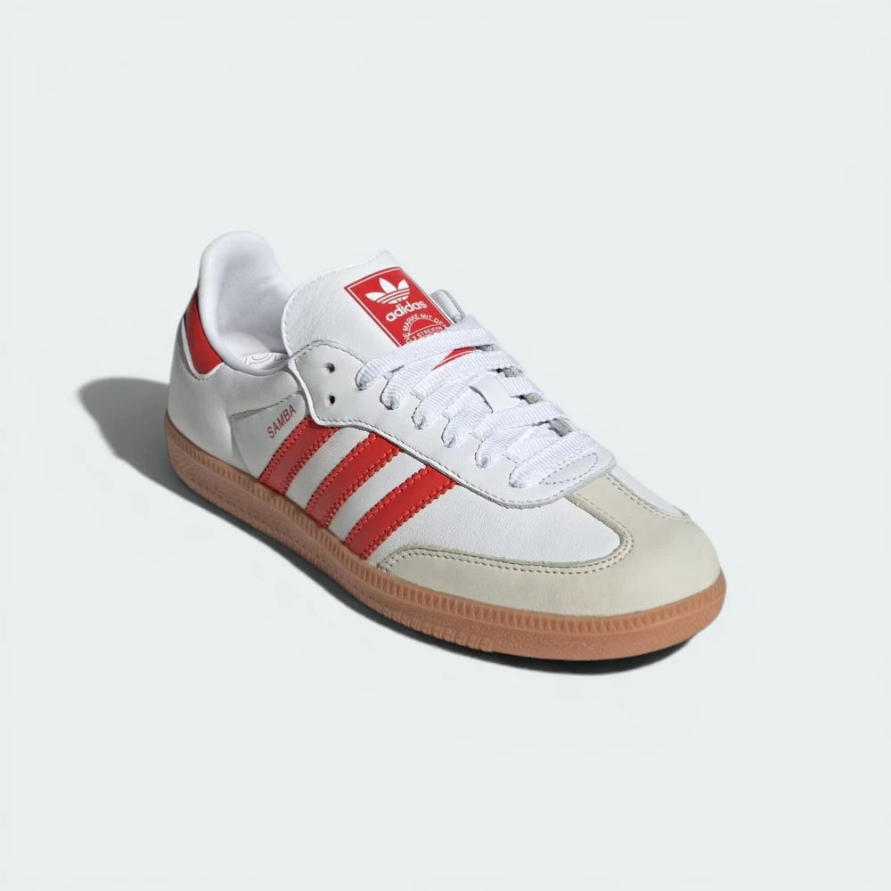 Three-quarter angle of the pair, emphasising the sleek profile and the gold foil "Samba" branding on the lateral side.