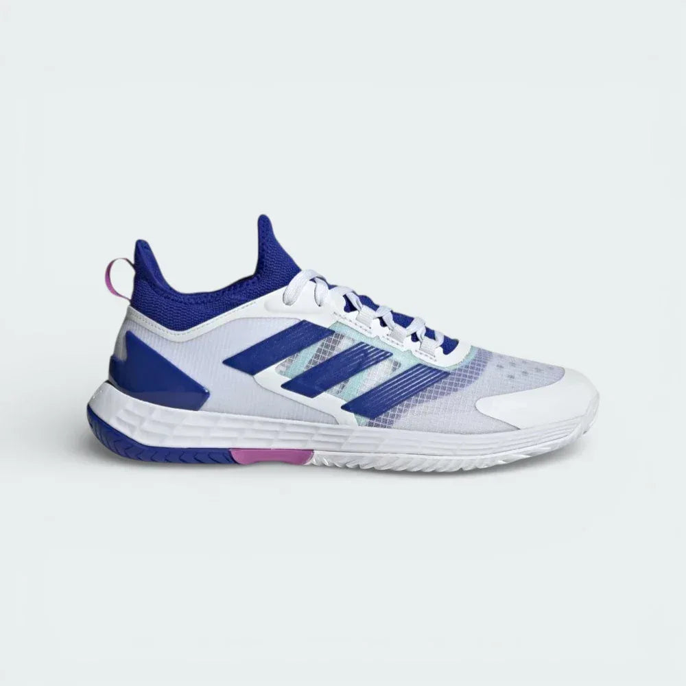 Side profile of the adidas Adizero Ubersonic 4.1 in White and Lucid Blue, showing the sleek mesh upper and the Purple Burst Lightstrike midsole.