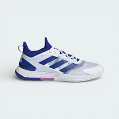 Side profile of the adidas Adizero Ubersonic 4.1 in White and Lucid Blue, showing the sleek mesh upper and the Purple Burst Lightstrike midsole.
