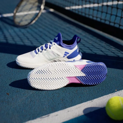 View of the Adiwear hard-court outsole, showcasing the specialized herringbone-style traction pattern for maximum grip.