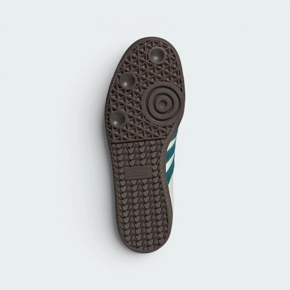 Displays the classic textured grid pattern of the vintage gum rubber outsole, engineered for unreal everyday multi-surface street grip.