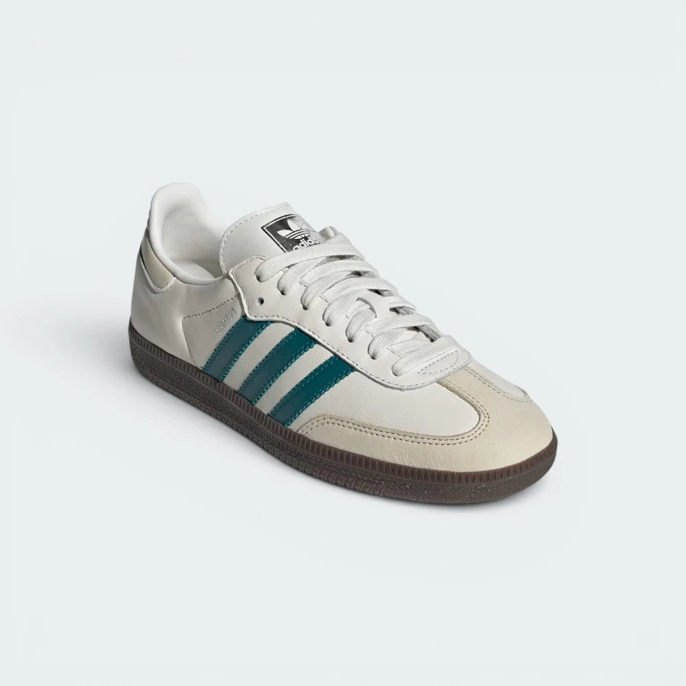 Emphasising the low-profile casual silhouette and the professional distribution of the rich teal leather overlays.