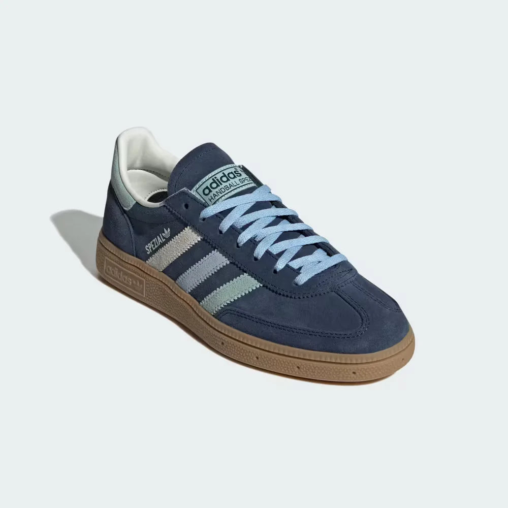 Angle View Showing the Side: Emphasizing the T-toe overlay and the vibrant green-on-navy colour blocking.