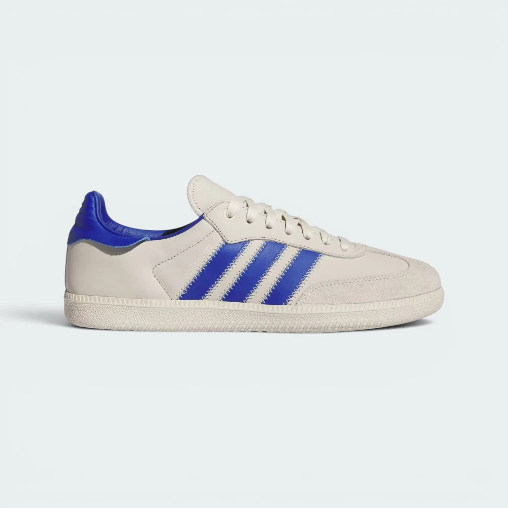 Highlights the high-velocity sweep of the zigzag-stitched 3-Stripes and the professional, minimalist depth of the Alumina coated ECCO leather and the unique floating heel tab.