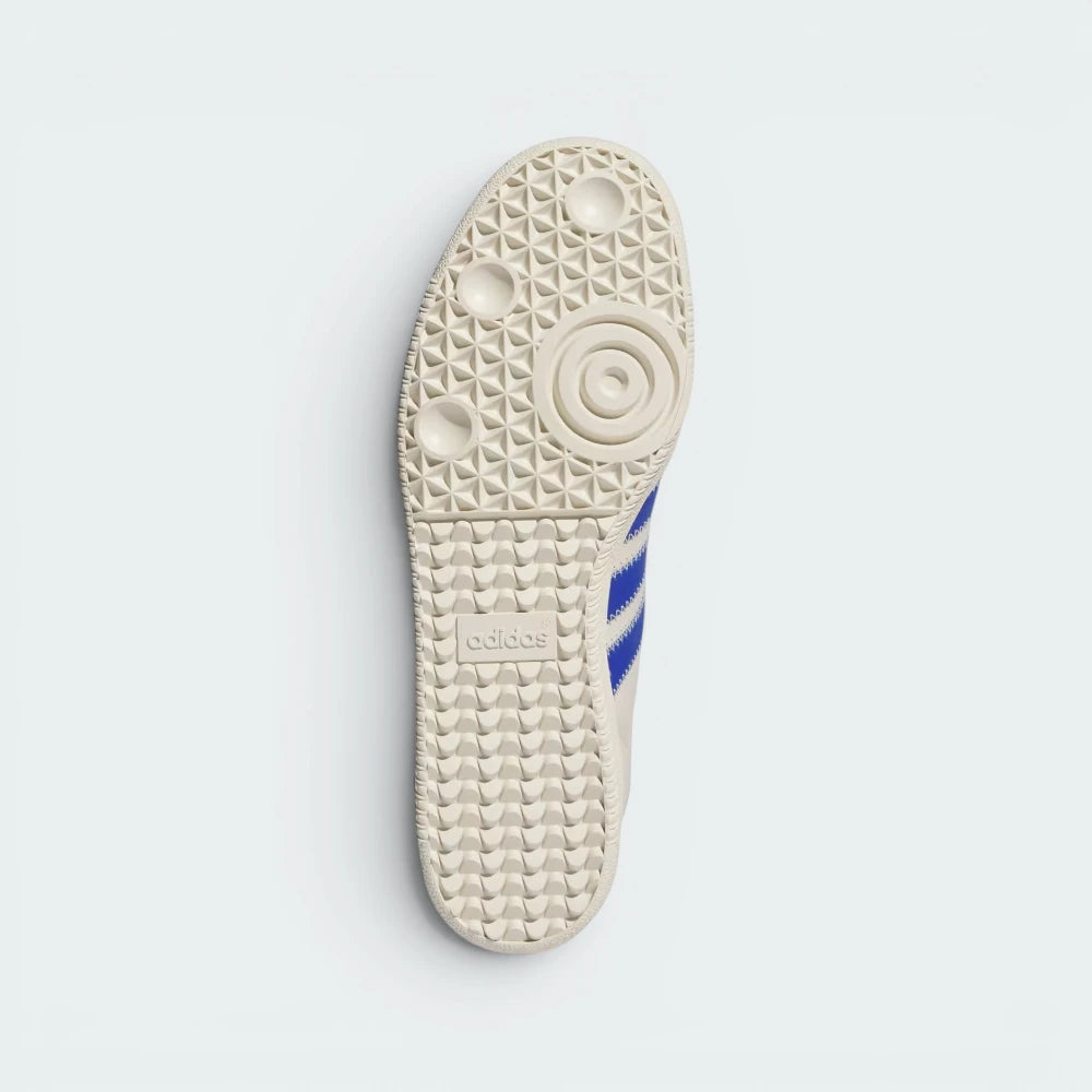 Displays the classic flat-grippy geometric traction pattern of the tonal rubber outsole, engineered for unreal everyday multi-surface street grip.