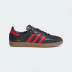 The Carbon Samba, highlighting the Better Scarlet 3-Stripes and the iconic translucent gum sole.