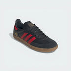Emphasising the T-toe overlay and the striking red-on-grey colour blocking.