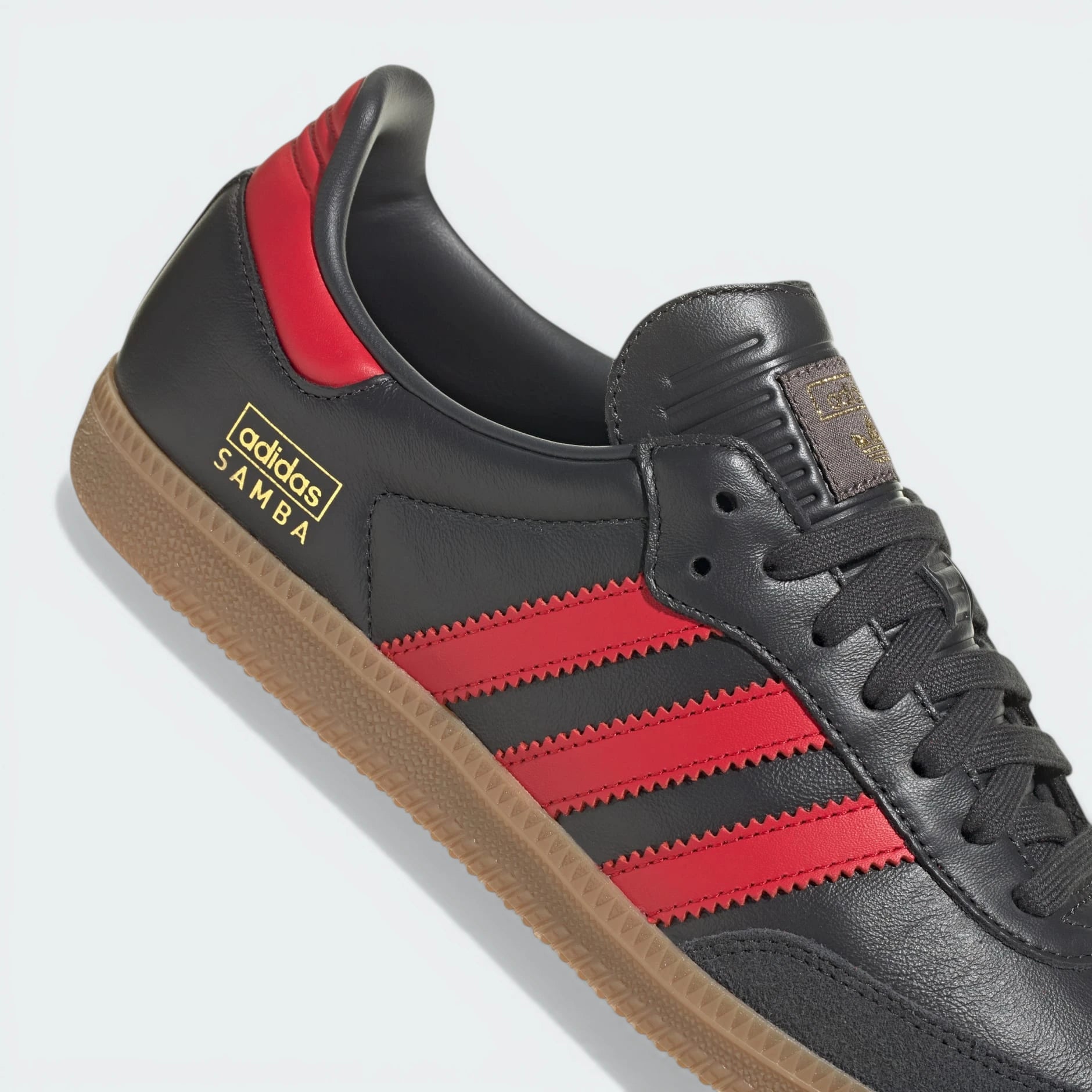 Highlighting the textured nature of the gum rubber and the high-quality gold foil detailing.