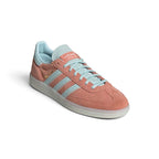 Angle View Showing Details Side by Side: Angled front-three-quarter perspective capturing the reinforced T-toe overlay, synthetic side panels, and contrasting pale blue stripes.   