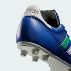 Rear view focusing on the reinforced heel counter and the clean "Copa Mundial" branding in gold/white.