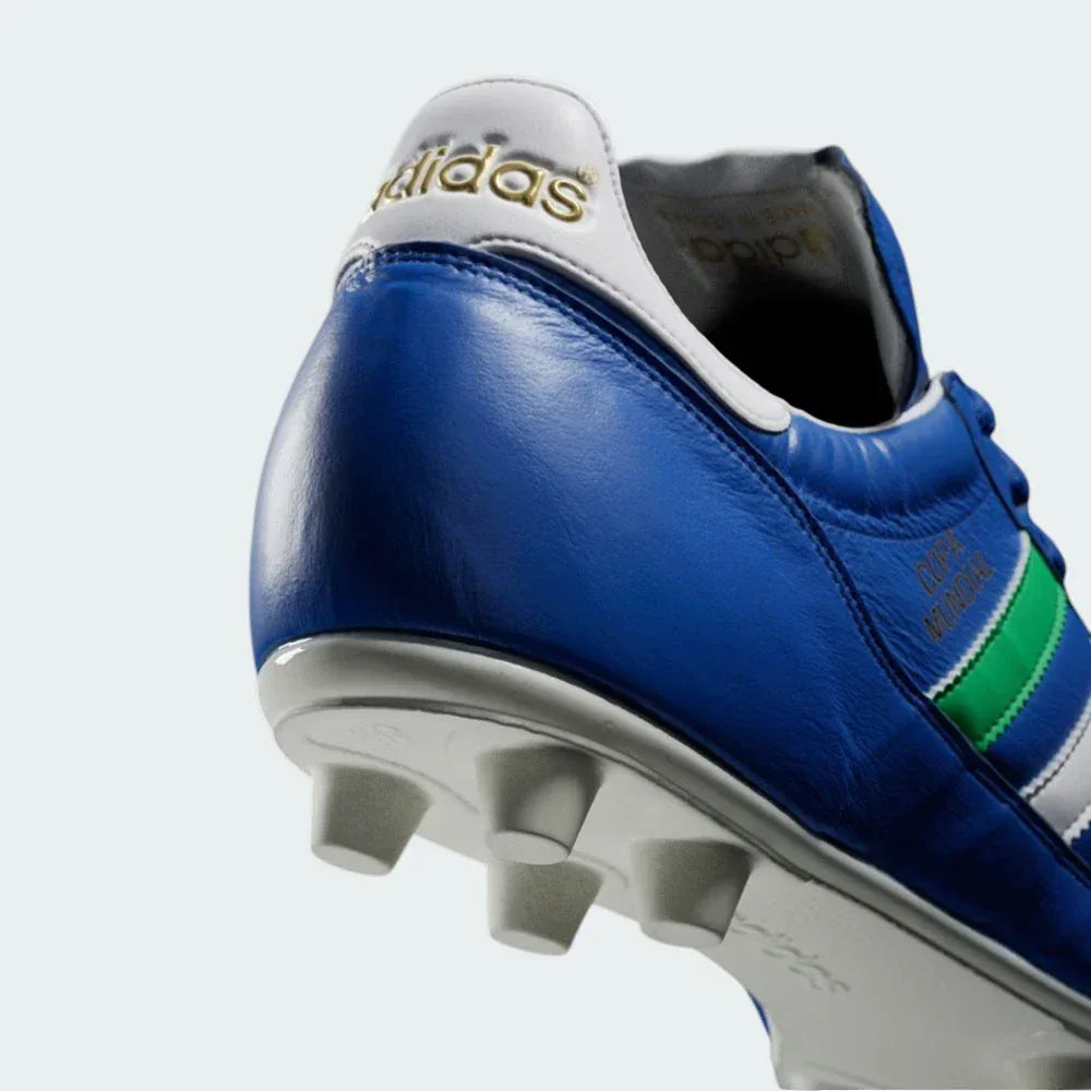 Rear view focusing on the reinforced heel counter and the clean "Copa Mundial" branding in gold/white.