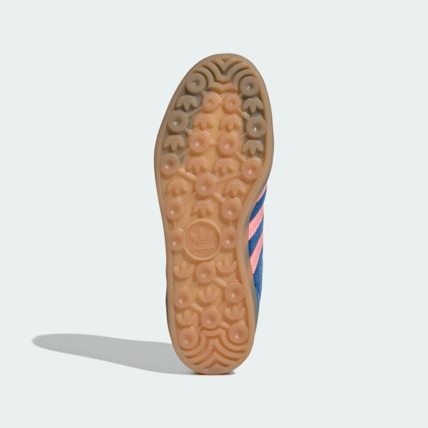 Outsole View: The classic "Indoor" traction pattern on the gum rubber, showcasing the semi-translucent finish.