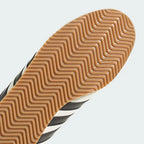 Highlighting the transition between the gum rubber and the cushioned EVA unit.