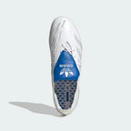 Top-down view of the Beckham edition boots, highlighting the clean white Fusionskin upper and the historic blue Trefoil logo on the tongue area.
