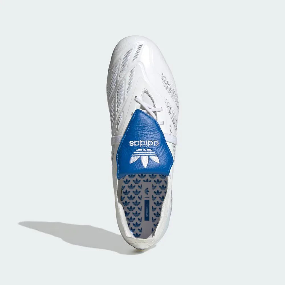 Top-down view of the Beckham edition boots, highlighting the clean white Fusionskin upper and the historic blue Trefoil logo on the tongue area.