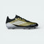 Side profile of the Gold Metallic adidas Messi F50 League boots, showing the black Three Stripes and the sleek aerodynamic silhouette.