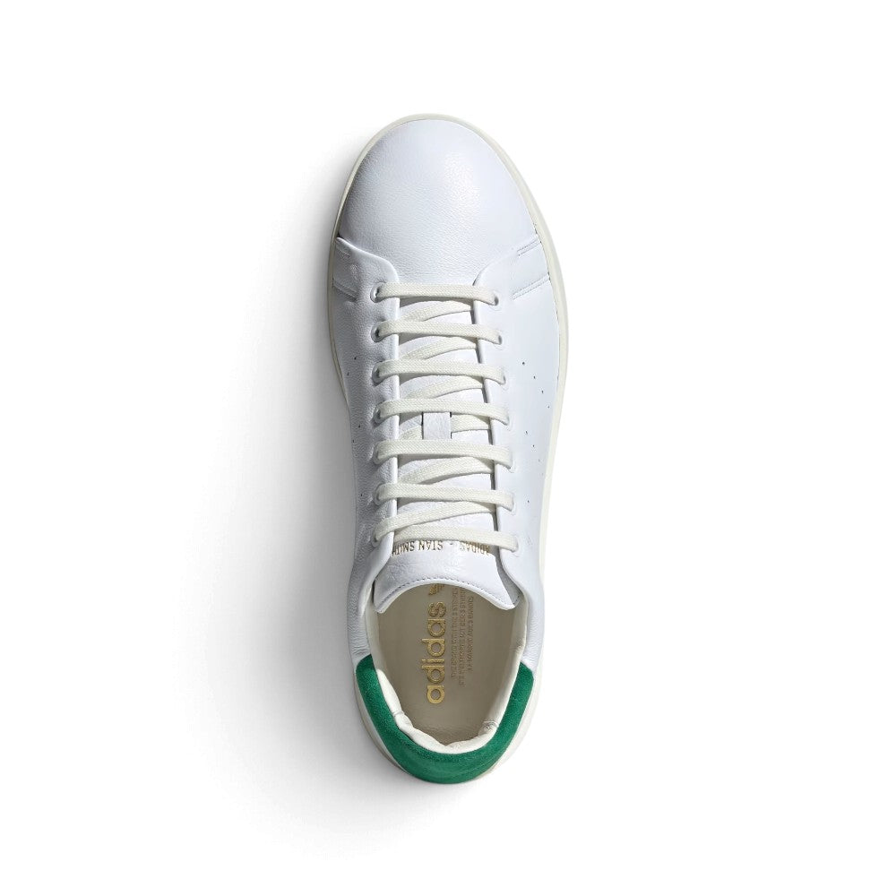 Top-Down Overhead View: Top-down view of both shoes displaying the symmetric lacing system, perforated toe boxes, and gold-toned tongue branding next to the inner collars.