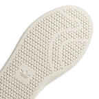 Outsole Texture Detail: Macro focus on the forefoot outsole pattern, highlighting the grip dots and durable rubber compound construction.