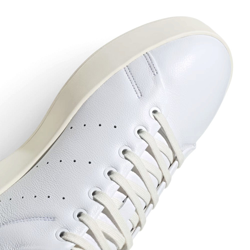 Forefoot Eyelet Zoom: Macro focus on the perforated sidewall and precision stitching around the white laces and metal eyelets.