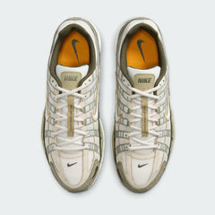 Top-down view of a pair of Nike P-6000 men's trainers in green, highlighting the intricate layered upper and lace-up closure.