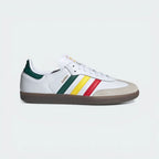 White sneaker with colorful stripes on a light gray background