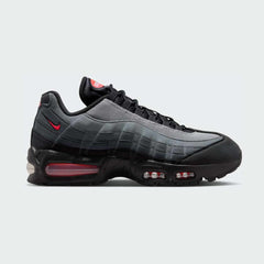 Nike Air Max 95 OG Men's running shoes in black with bright crimson red accents, side profile showing visible Max Air units in the heel and forefoot, and a layered upper.