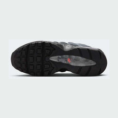 View of the outsole of the Nike Air Max 95 OG Men's black running shoes, showing the durable rubber waffle tread pattern.