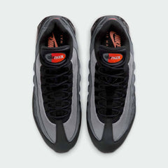 Top-down view of a pair of Nike Air Max 95 OG Men's running shoes in black, highlighting their iconic silhouette and lacing system.