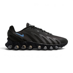 Nike Air Max DN Men's running shoes in black and grey, side profile showing visible Dynamic Air unit in the heel, textured upper, and blue accents.