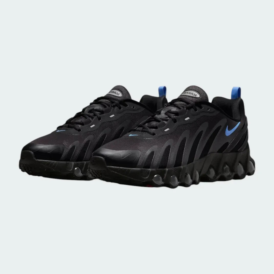Angled view of two Nike Air Max DN Men's black running shoes, side by side, showcasing their bold, modern design and prominent Air unit.