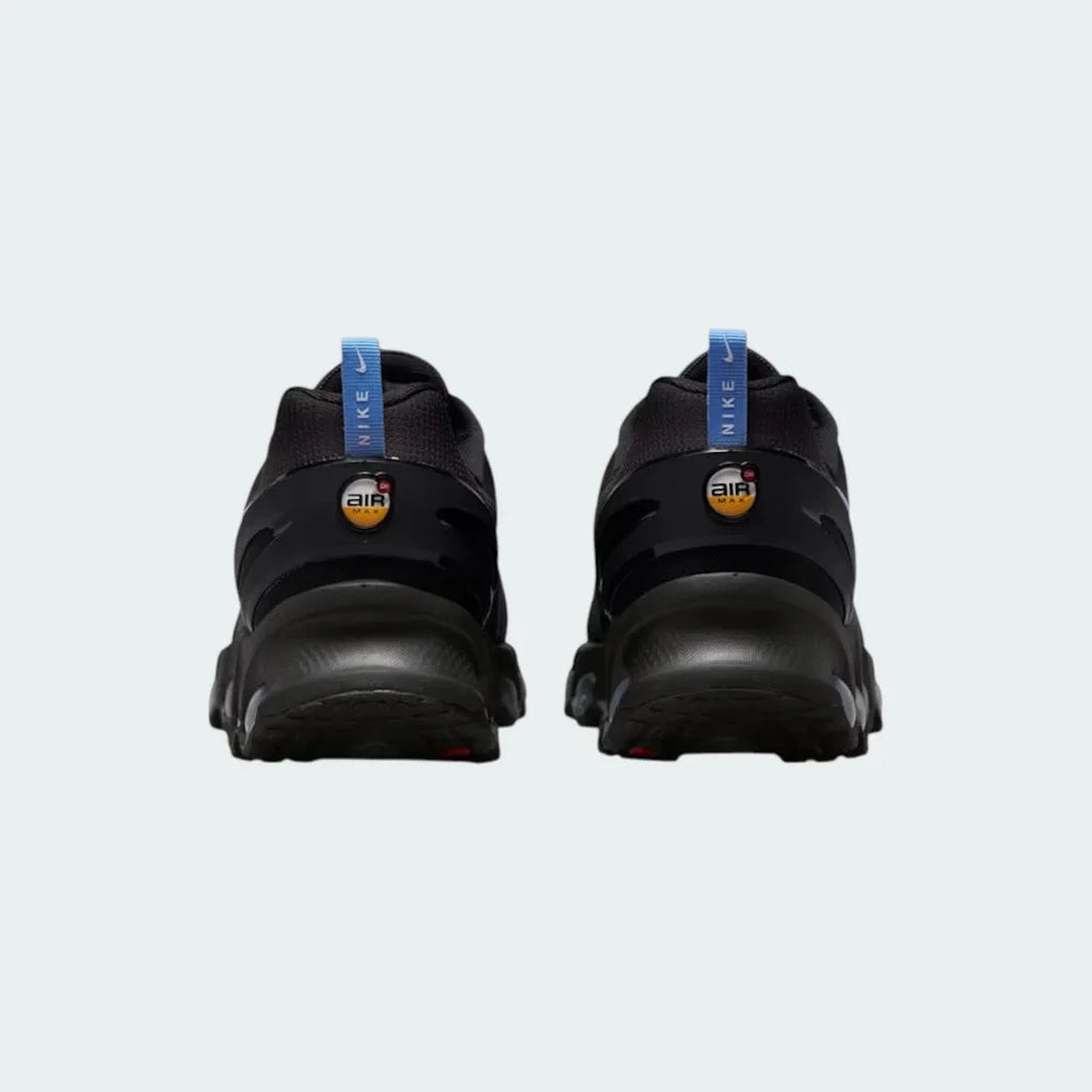 Rear view of the Nike Air Max DN Men's black running shoes, focusing on the visible Dynamic Air unit in the heel and molded heel counter.