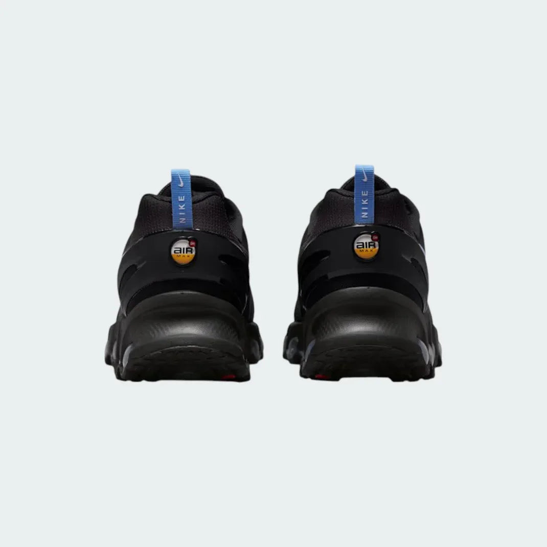 Rear view of the Nike Air Max DN Men's black running shoes, focusing on the visible Dynamic Air unit in the heel and molded heel counter.