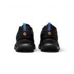Rear view of the Nike Air Max DN Men's black running shoes, focusing on the visible Dynamic Air unit in the heel and molded heel counter.