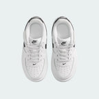 Top-down view of a pair of Nike Air Force 1 Low EasyOn Kids' trainers in white, highlighting the wide opening mechanism and iconic silhouette.