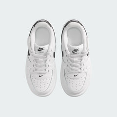 Top-down view of a pair of Nike Air Force 1 Low EasyOn Kids' trainers in white, highlighting the wide opening mechanism and iconic silhouette.