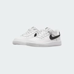 Angled view of two Nike Air Force 1 Low EasyOn Kids' trainers in white and black, side by side, showcasing their timeless design and clean aesthetic.