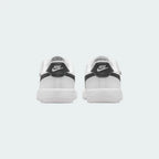 Rear view of the Nike Air Force 1 Low EasyOn Kids' white trainers, focusing on the heel panel and Nike Air branding.